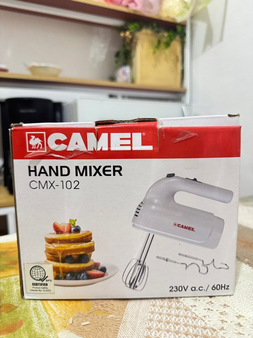 Brand New Hand Mixer — Never Opened, Never Used (Category: Bakeware) located in Mandaluyong City. Submitted by quietpoint1234 (Listing ID 1371758820, Image 3). Description: Selling a hand mixer, brand new — never opened, never used. ✔ Still in original packaging ✔ Perfect for baking, whipping, mixing ✔ Great deal for anyone looking for a handy kitchen tool Selling because we migrated. Feel free to DM me for more details or photos. Price is negoti