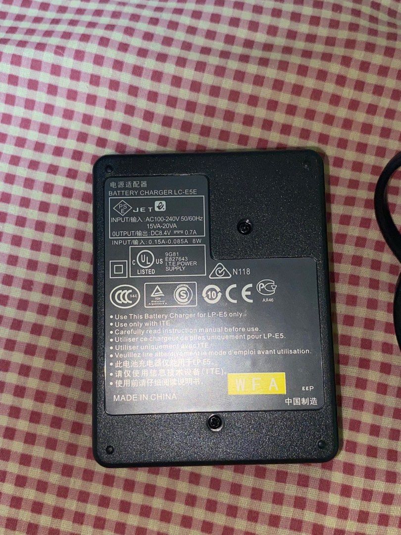 Canon Charger LP-EA (Category: Chargers) located in Manila. Submitted by xiaotingworld (Listing ID 1371866709, Image 2). Description: Bought brand new and used only once. It’s working—light turns on when the battery is inserted. RFS: Tried it with our old DSLR camera, but it turns out the camera itself is broken, so I can’t use this anymore..