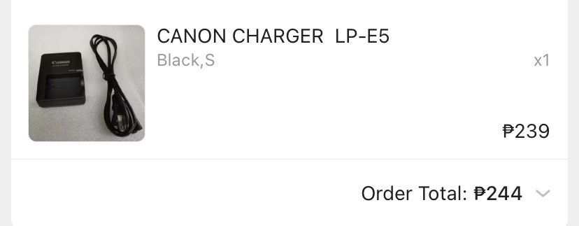Canon Charger LP-EA (Category: Chargers) located in Manila. Submitted by xiaotingworld (Listing ID 1371866709, Image 3). Description: Bought brand new and used only once. It’s working—light turns on when the battery is inserted. RFS: Tried it with our old DSLR camera, but it turns out the camera itself is broken, so I can’t use this anymore..