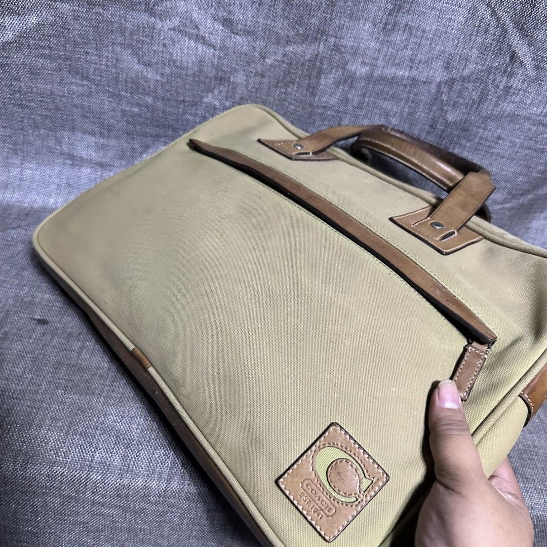 Coach document bag (Category: Luxury Bags & Wallets) located in Manila. Submitted by greyinfash06839 (Listing ID 1371895678, Image 3). Description: 🤍Item: Coach document bag 🤍Brand: Coach 🤍Matirial: Canvas 🤍Quality: Original 🤍color: Brown 🤍Size: Large 🤍Dimension. H: 11 L: 15 W: 2 🤍Sex: For Men 🤍Issue: Watermark 🤍Condition Rate: 8/10 🤍Other info:.