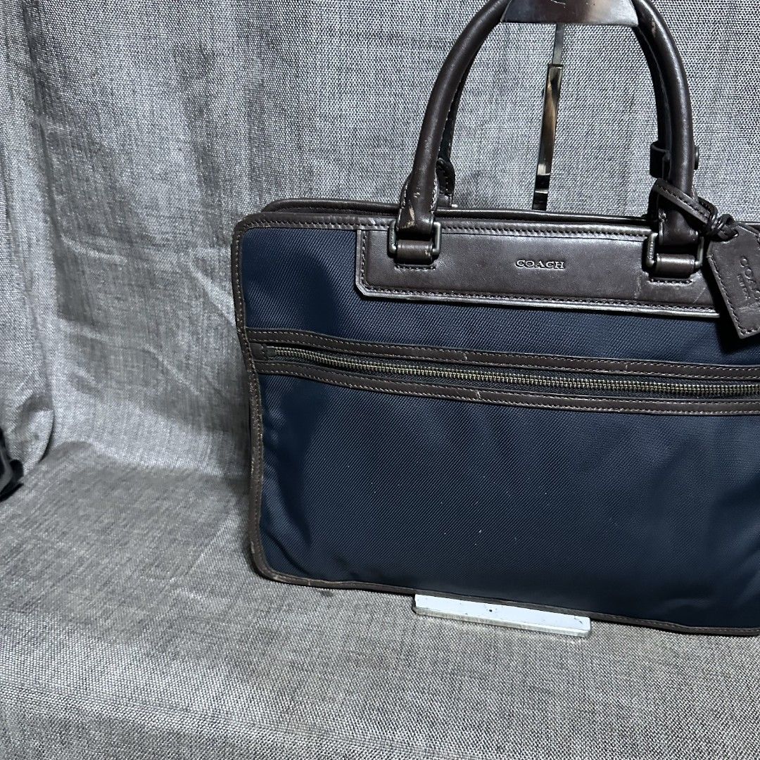 Coach document bag (Category: Luxury Bags & Wallets) located in Manila. Submitted by greyinfash06839 (Listing ID 1371896116, Image 3). Description: 🤍Item: Coach document bag 🤍Brand: Coach 🤍Matirial: Nylon 🤍Quality: Original 🤍color: Blue 🤍Size: Large 🤍Dimension. H: 11 L: 15 W: 2 🤍Sex: For Men 🤍Issue: Sign of use 🤍Condition Rate: 9/10 🤍Other info:.