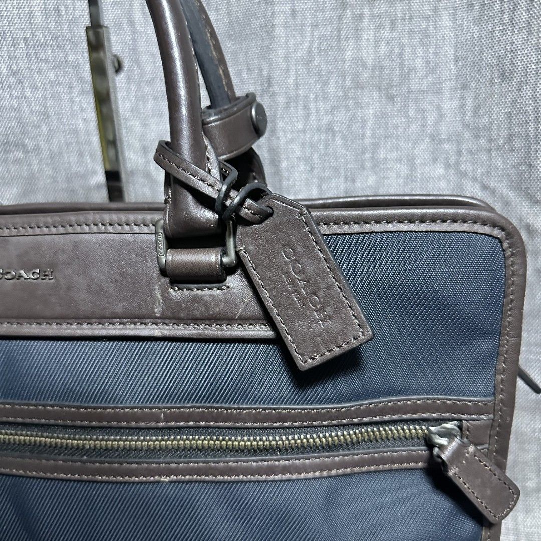 Coach document bag (Category: Luxury Bags & Wallets) located in Manila. Submitted by greyinfash06839 (Listing ID 1371896116, Image 2). Description: 🤍Item: Coach document bag 🤍Brand: Coach 🤍Matirial: Nylon 🤍Quality: Original 🤍color: Blue 🤍Size: Large 🤍Dimension. H: 11 L: 15 W: 2 🤍Sex: For Men 🤍Issue: Sign of use 🤍Condition Rate: 9/10 🤍Other info:.
