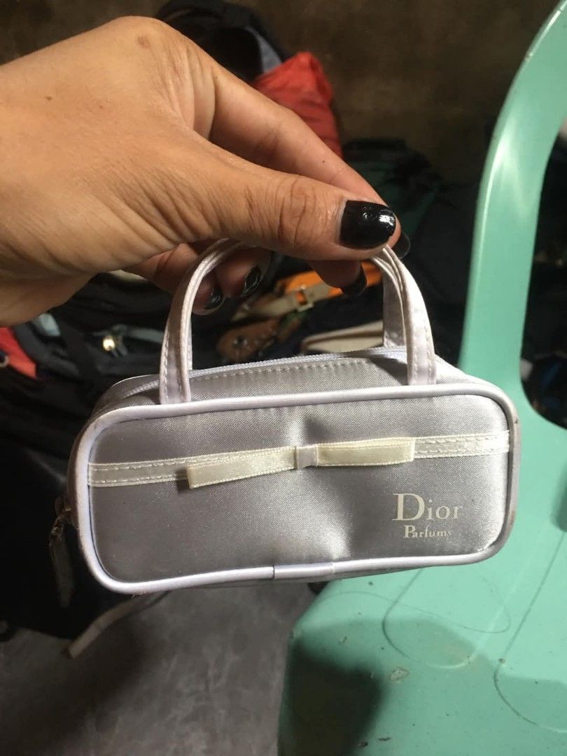 DIOR PARFUMES (Category: Luxury Bags & Wallets) located in Panabo. Submitted by albasinser75897 (Listing ID 1371827996, Image 1). Description: Dior PARFUMES pwd gawing wallet.