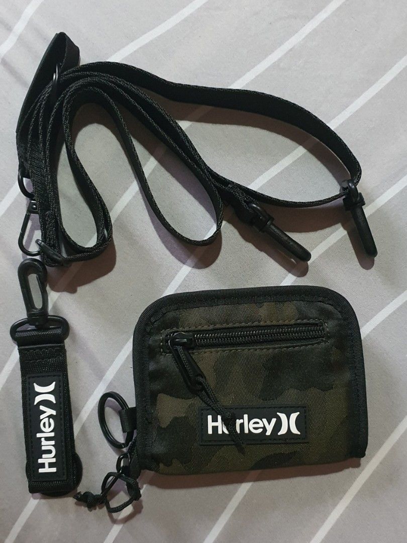Hurley canvas 2 way wallet with strap (removable) (Category: Luxury Bags & Wallets) located in Makati City. Submitted by kaecee. (Listing ID 1371820928, Image 2). Description: Hurley canvas 2 way wallet with strap and key holder (removable).