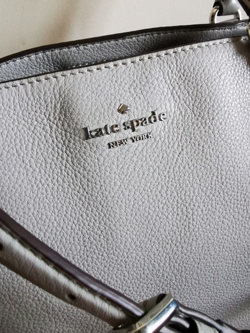 Kate spade shoulder bag (Category: Luxury Bags & Wallets) located in Makati City. Submitted by photosgadez79399 (Listing ID 1371805098, Image 3). Description: 100%authentic Kate Spade Jackson Triple compartment bag Color light gray Pebbled leather exterior Two way spade jacquard lining Zip & snap closure Double handles & detable straps Size: 8.3"h x 11.4"w x 4.9"d Drop length 22" Handle drop 5" Condition: 9/10 Used only a few times Dust bag not i