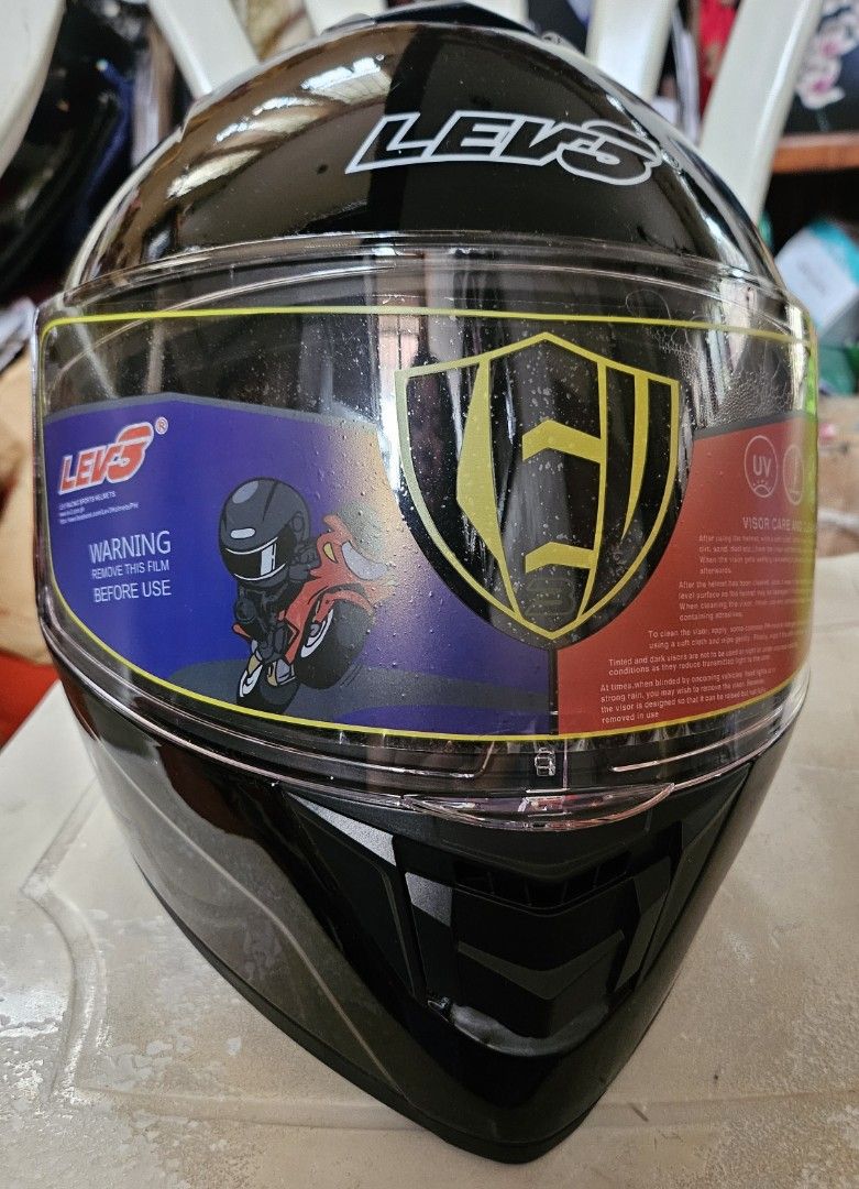 Lev3 Black Dual Visor Helmet size XL (Category: Helmets and other Riding Gears) located in Las Pinas. Submitted by tsuki25 (Listing ID 1371732944, Image 1). Description: Helmet is new and never used. With extra visor and helmet cloth bag. Brand: Lev3 (wala lang sa choices kaya ibang brand ang naka-list) Carton box is slightly dented from storage, will fix and clean it pag may bibili, but the helmet is clean and in great condition. payment: Gcash 