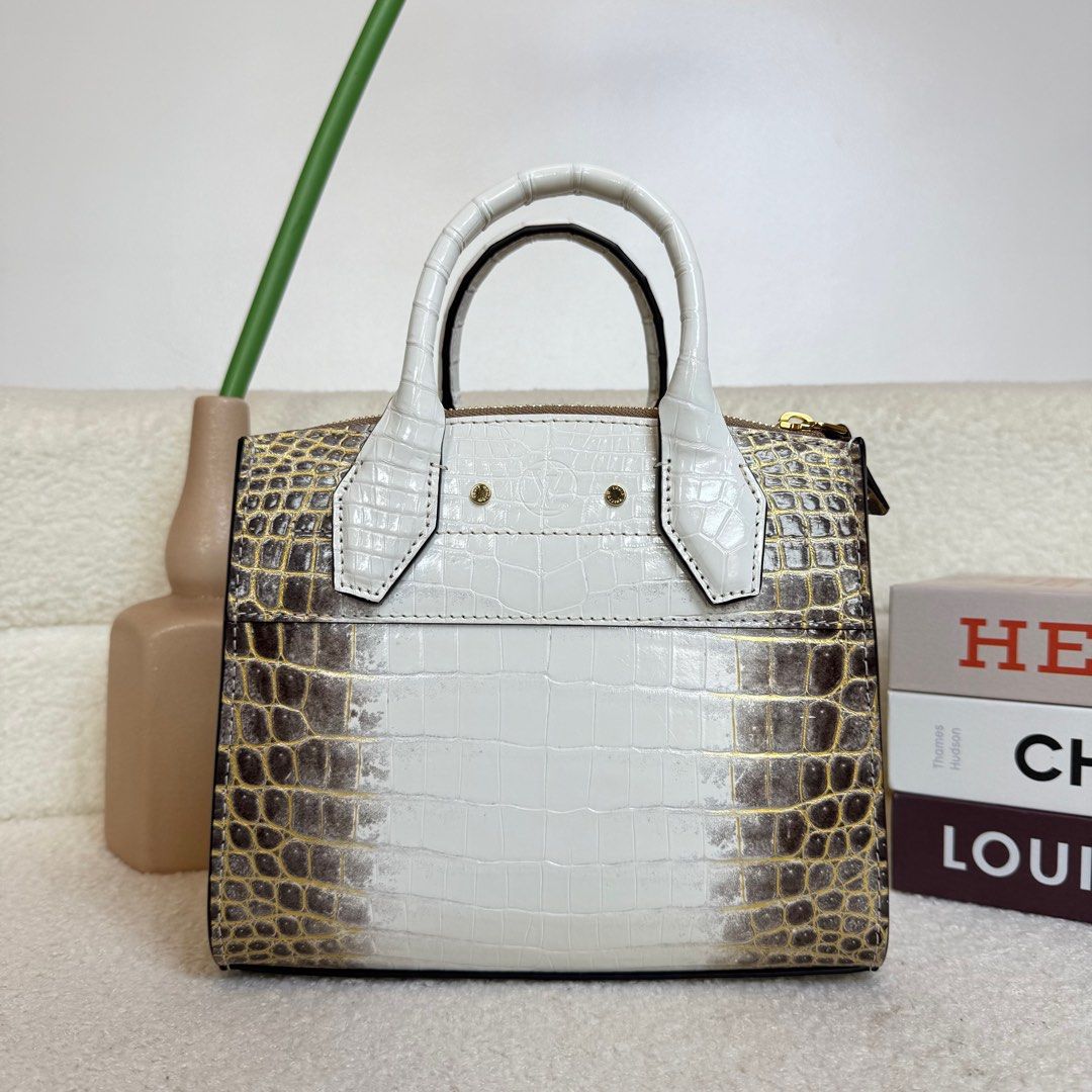 Louis Vuitton Steamer Crocodile (Category: Luxury Bags & Wallets) located in Manila. Submitted by cjv.luxury (Listing ID 1371790916, Image 3). Description: CJV-31850 Inclusions: Entrupy, Dr. Runway Certificate, Dustbag, Permit, Strap & Box ✅ All items are available for 3 months layaway ✅ For cash buyers, items are negotiable. Just shoot your offer ✅ Trades are welcome, you can bring other luxury bags/items that you wish to sell and we can convert