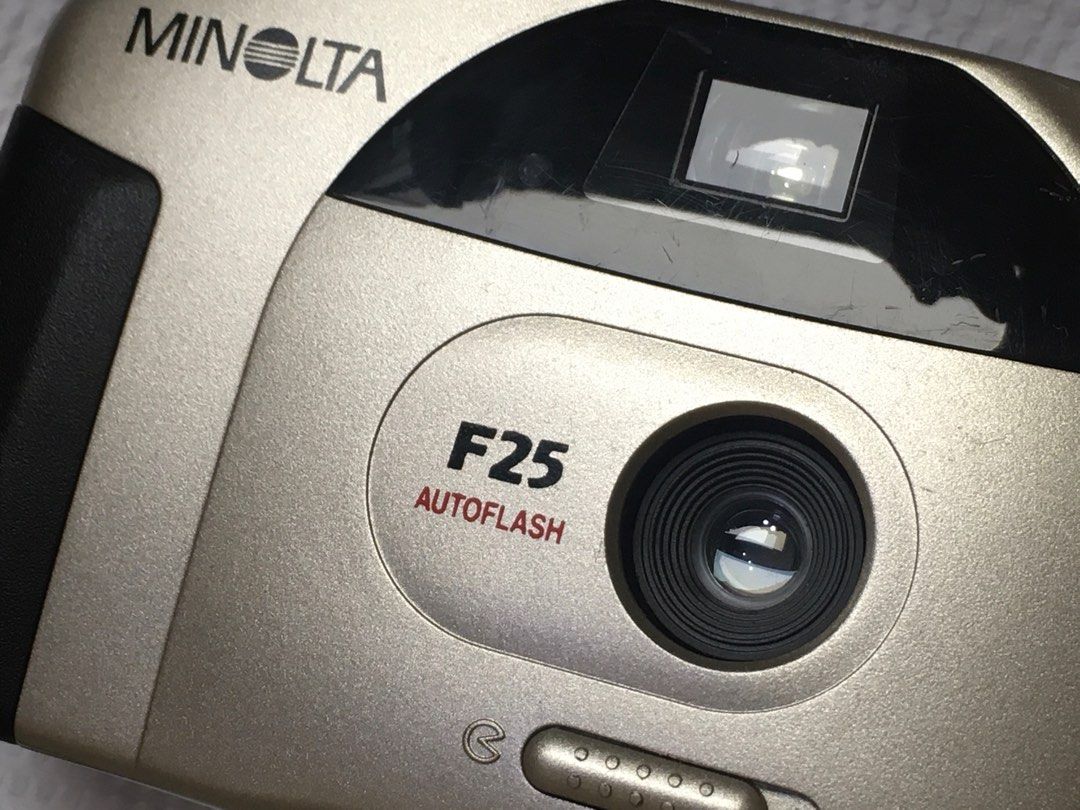 Minolta F25 film camera (Category: Other Photography Accessories) located in Las Pinas. Submitted by film101 (Listing ID 1371863917, Image 3). Description: Minolta F25 Its fixed focus lens Automatic flash system Slack and shoot Working shutter Working flash Working advance Working aperture Working meter .
