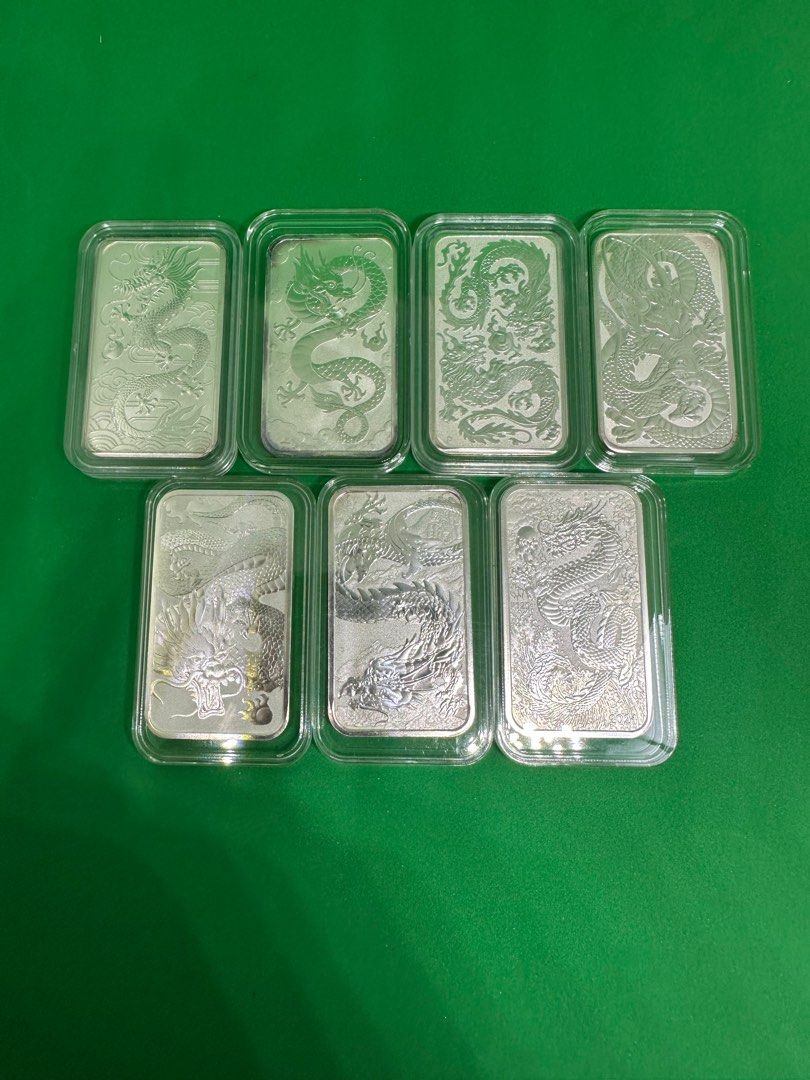 PERTH MINT DRAGON RECTANGULAR SILVER BAR FULL SET 2018 -2024 (Category: Currency) located in Singapore. Submitted by starbullion (Listing ID 1371894201, Image 1). Description: The Dragon Rectangular Coin is a bullion coin produced by the Perth Mint since 2018.[1][2] Resembling a cross between conventional gold and silver coins and gold and silver bars, the silver coin has a face value of one Australian dollar, while the gold version has a face va