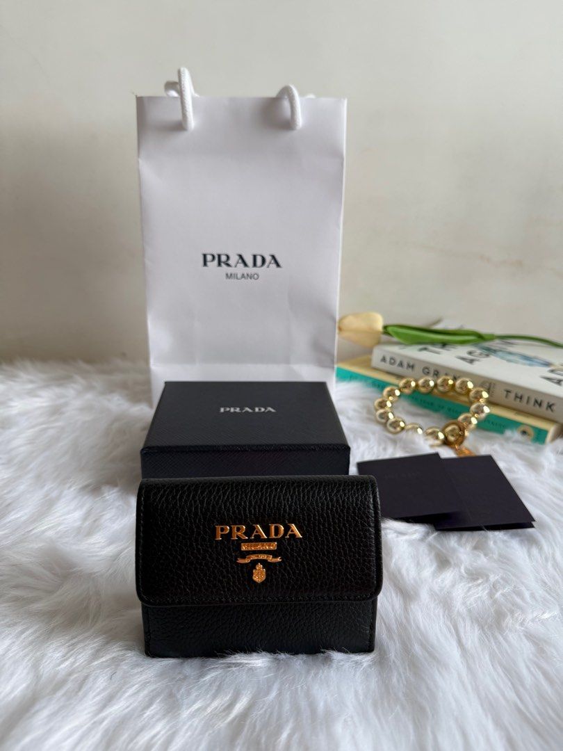Prada Small Wallet (Category: Luxury Bags & Wallets) located in Manila. Submitted by tonieesto34469 (Listing ID 1371760164, Image 1). Description: With dustbag, box, copy receipt & paper bag. Giftable item. .