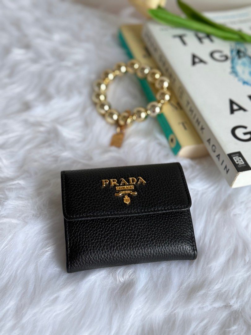 Prada Small Wallet (Category: Luxury Bags & Wallets) located in Manila. Submitted by tonieesto34469 (Listing ID 1371760164, Image 2). Description: With dustbag, box, copy receipt & paper bag. Giftable item. .