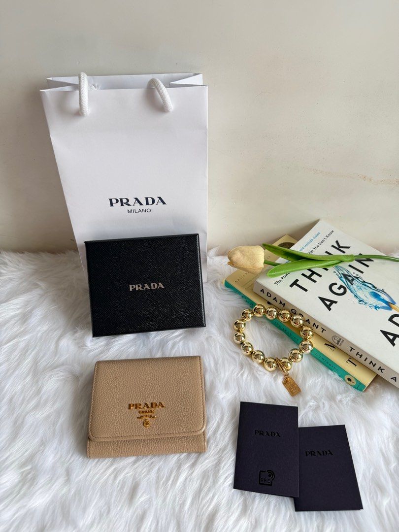 Prada Small Wallet Bnew (Category: Luxury Bags & Wallets) located in Manila. Submitted by tonieesto34469 (Listing ID 1371760496, Image 3). Description: With dustbag, box, copy receipt & paper bag. Giftable..