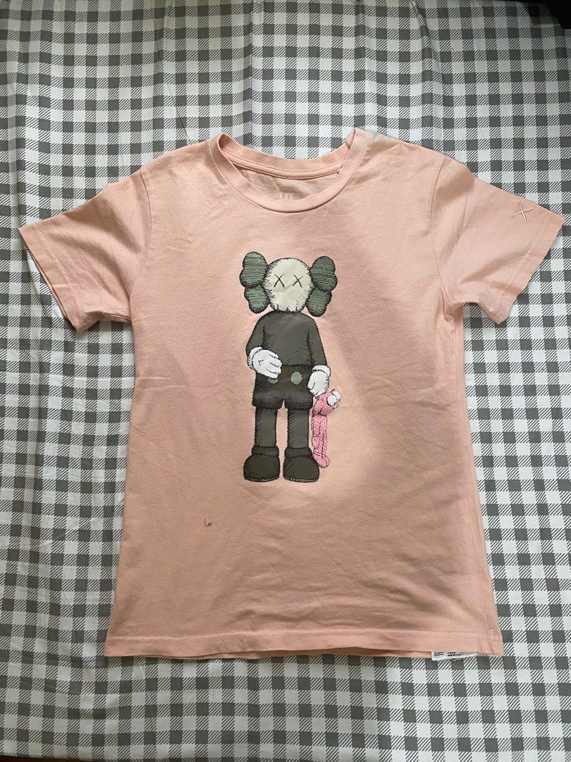 Uniqlo Kaws Tshirt (Category: Shirts) located in Cagayan de Oro. Submitted by medyomalditaaa (Listing ID 1371814038, Image 1). Description: Uniqlo Kaws Tshirt - siza small - 8/10 condition - issues: blue stain sa shoulder - original 150 + sf Shipper via jnt/flash express.