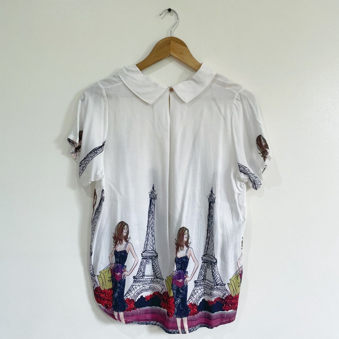 White collared short sleeve blouse with print (Category: Blouses) located in Quezon City. Submitted by HannoCollection (Listing ID 1371764606, Image 2). Description: Freesize, but best fits M to L ✔️ Most prices are NEGOTIABLE. PM is key ✔️ ACTUAL PHOTOS POSTED ✔️ COD Available (with additional 15% fee) ✔️ MOP: GCash or Landbank, ꜱʜᴏᴘᴇᴇ checkout (SCO for delivery) ✔️ same day delivery within MM available.