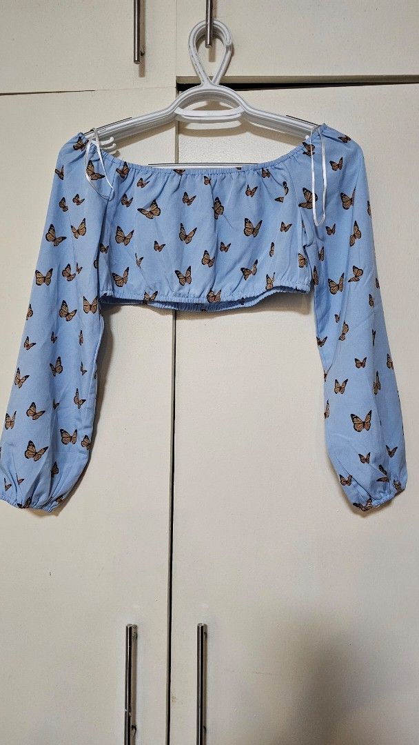 Zalora off shoulder blue crop top (Category: Others Tops) located in Quezon City. Submitted by mommadeclutterph (Listing ID 1371736994, Image 1). Description: Bought then stored. BNWOT.