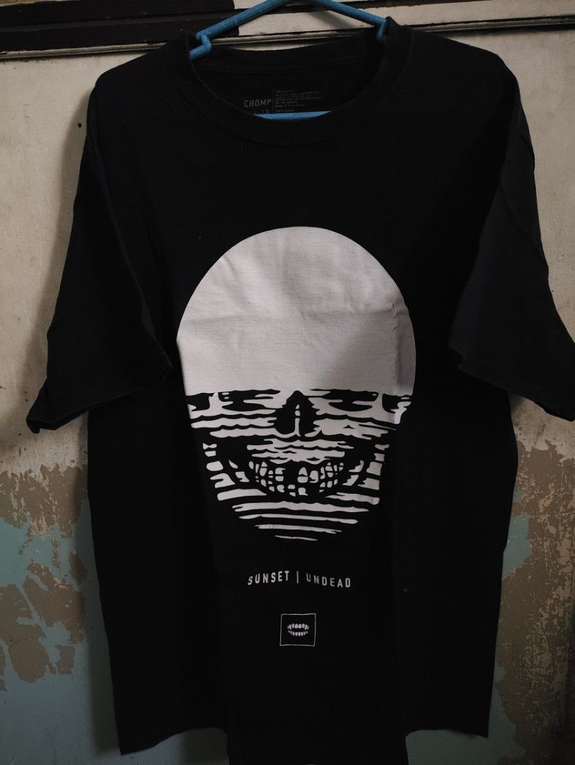 CHOMP SKULL TEE (Category: Tshirts & Polo Shirts ) located in Makati City. Submitted by nthy06 (Listing ID 1366957466, Image 1). Description: CHOMP SKULL UNDEAD TEE SIZE M (19W X 28L) NO ISSUE VERY GOOD CONDI 9/10 COLOR RATE.