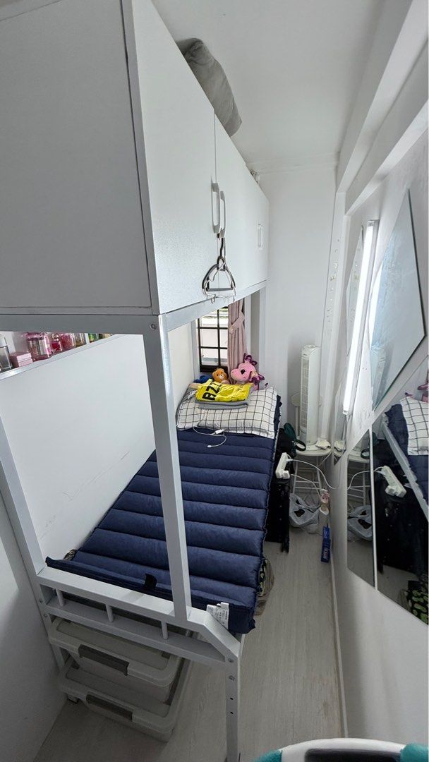 Customization helper bed with cabinet for bomb shelter / small room helper bed/ kids bed/storage bed/low bed/small bed (Category: Bed Frames & Mattresses) located in Singapore. Submitted by nanasmith (Listing ID 1353665958, Image 2). Description: - Fully Customizable Size: Designed to fit any space, perfect for bomb shelters, storerooms, or helper rooms. - Maximizes storage and utility in compact areas, ideal for limited spaces. - Cost effective 