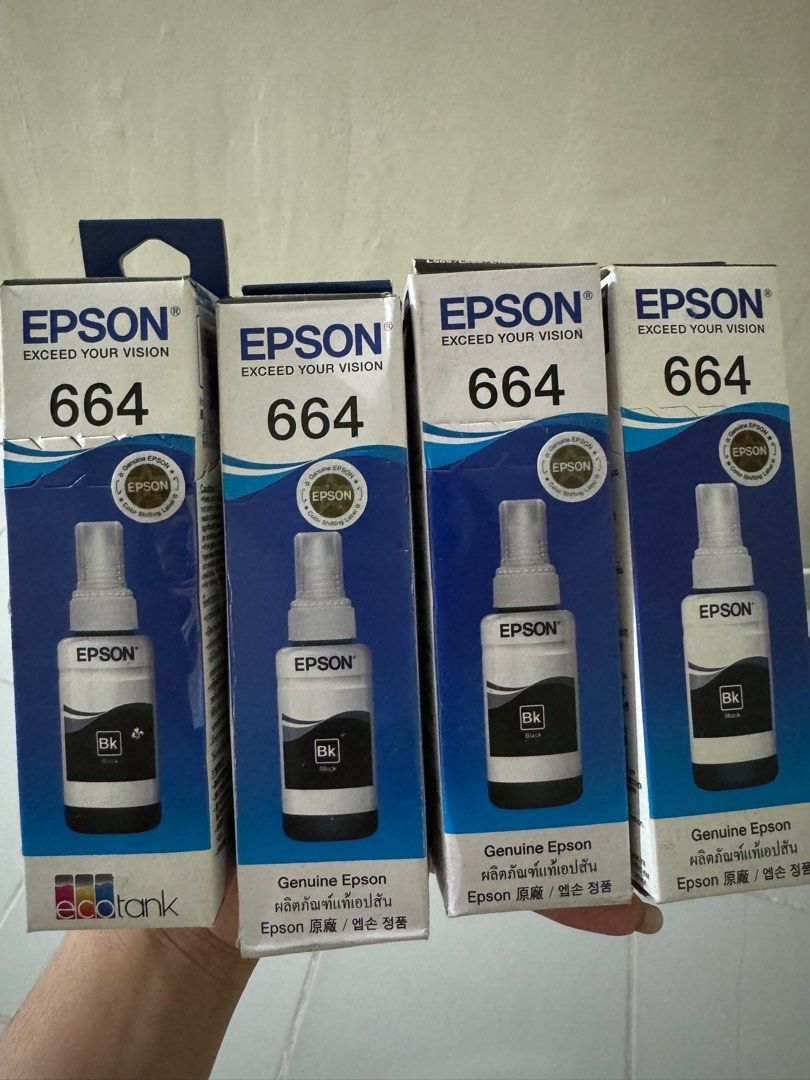 Epson 664 Ink (4pcs for ₱300) (Category: Printers, Scanners & Copiers) located in Santo Tomas. Submitted by heyallysa (Listing ID 1367006693, Image 1). Description: Epson 664 Ink 4pcs for ₱300 Brandnew.