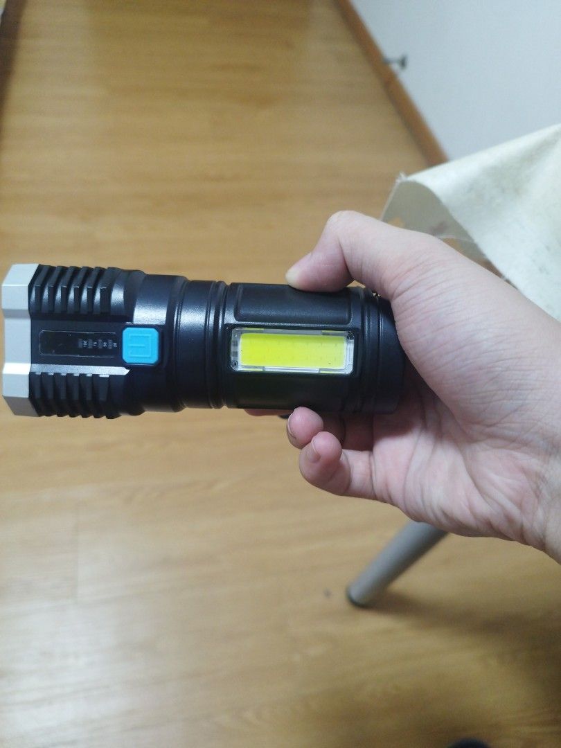 Flashlight (Category: Emergency Tools) located in Singapore. Submitted by fragrancejoe (Listing ID 1367054367, Image 3). Description: strong flashlight, different modes, selling since I don't use.