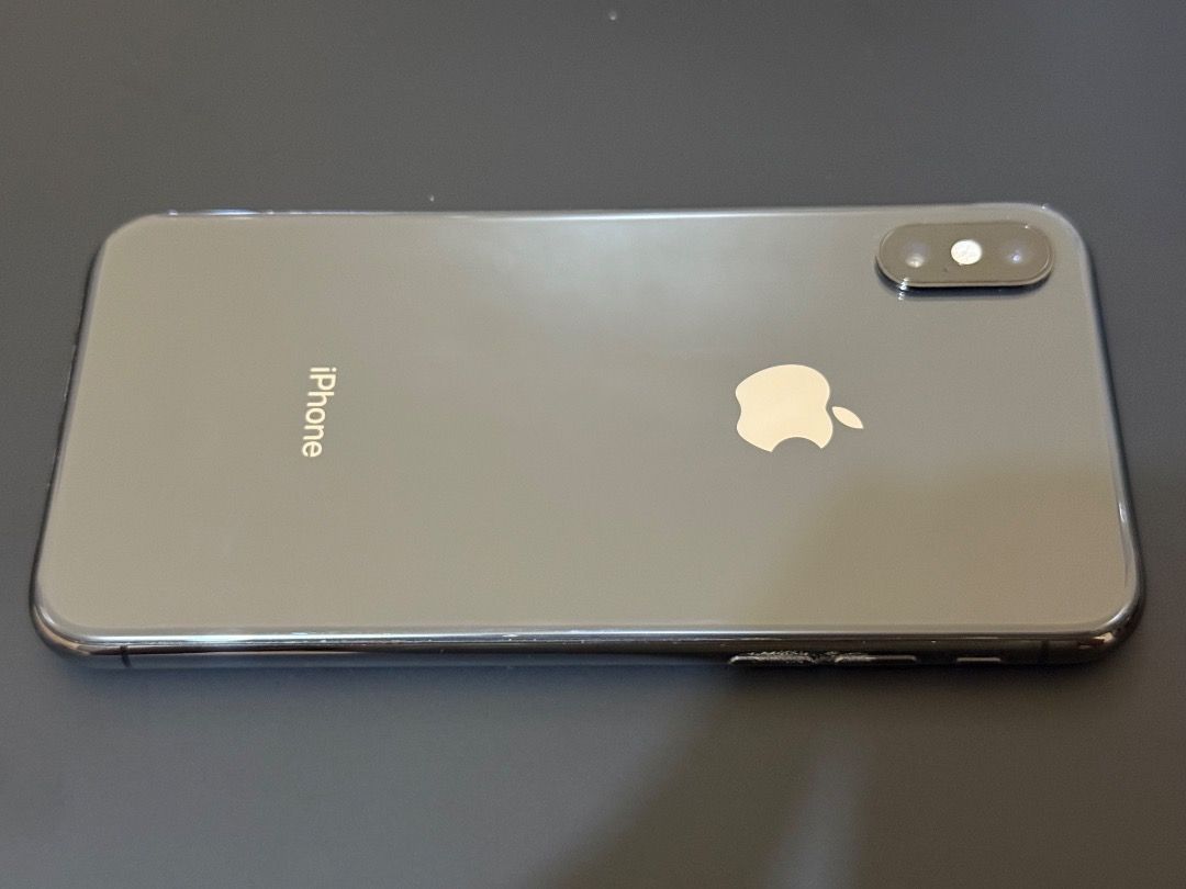 iPhone XS 64 GB (Category: iPhone X Series) located in Caloocan City. Submitted by gjnth (Listing ID 1367027602, Image 2). Description: Selling my extra phone. No to lowballers please. Please read: - Black - 64 GB; updated to iOS 18.1 - Unit and original black leather iPhone case only (no box and charger) - never been opened - original battery needs replacement - has hairline scratches on the back; case marks - screen is a little bit protruded bu