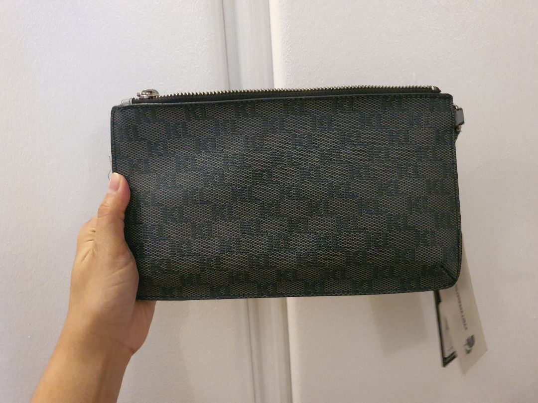 Karl Lagerfeld Paris Large Wristlet (Category: Wallets & Card holders) located in Marilao. Submitted by dlane (Listing ID 1366975676, Image 2). Description: Di na po ginamit since nagka baby. Na stock na lang sya. Barely used din sya before. See actual photos for some signs of usage. Ang ganda pa super kaya lang need to let go na for some cabinet space..