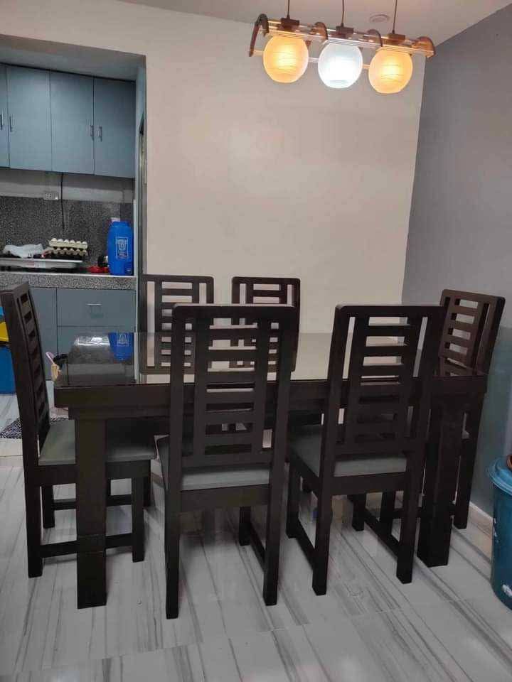 MAHOGANY DINING TABLE (Category: Tables & Sets) located in Mabalacat. Submitted by joemamangun01 (Listing ID 1366996287, Image 1). Description: High-quality Dining table set at an affordable price👌 Materials used: 📌Gemelina & mahogany wood 📌Uratex foam 📌German leather & fabric 📌Duco paint finished MADE TO ORDER⚒️ NO DP NEEDED✅ FREE TOP GLASS😍 COD & FREE DELIVERY 4 seater (3ft by 4ft) 6 seater (3ft by 5ft) 8 seater (3ft by 6ft) 10 seater (3f