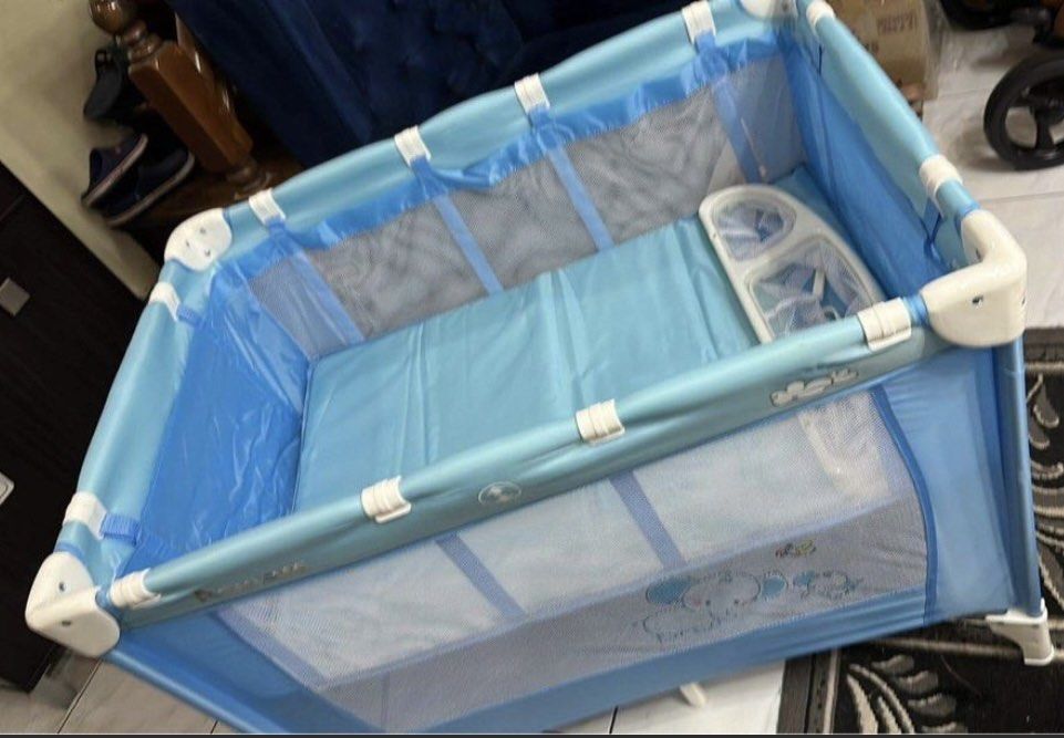 Nursery Playpen Portable and Folding Play Yard (Category: Cots & Cribs) located in Quezon City. Submitted by cocloset85 (Listing ID 1366947090, Image 1). Description: ● Recomended age: Newborn to 24months ● Folding panel with foam padding as mattress ● Very Durable ● Folds small and has it’s own crib storage bag ● Wheels on one side for easy moving ● Easy to Clean ● Made up of non toxic materials ● Portable and Lightweight ● Bed depth: 34-62cm ● 