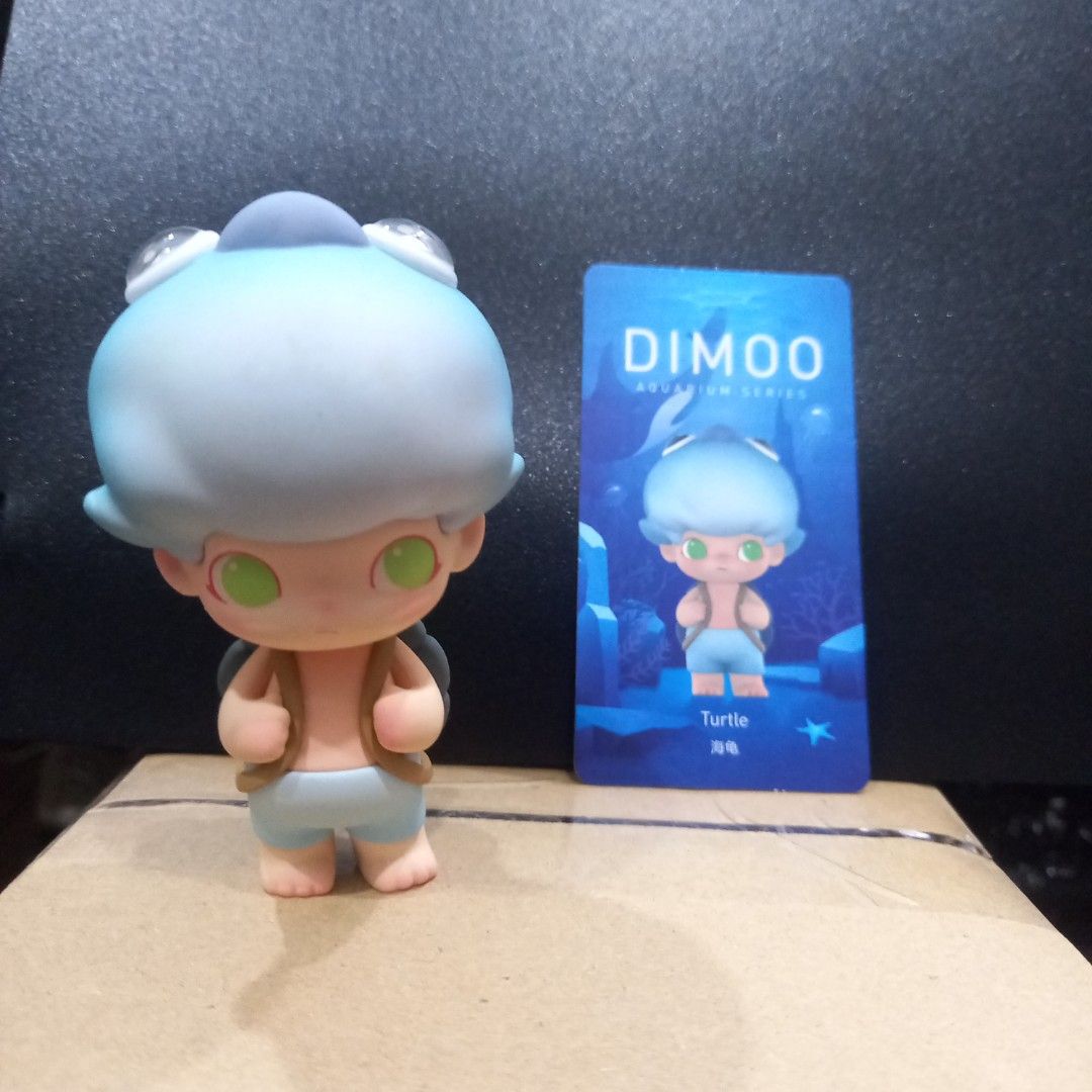 Popmart Dimoo Aquarium Series Turtle (Category: Designer & Blind Box Toys) located in Makati City. Submitted by thesupshop (Listing ID 1367063180, Image 1). Description: Slight Discoloration on Dimoo's head. No box but with Card. Will secure packaging with corrugated box. Can ask for additional photos. MOP: GCash / Maya MOD: Lalamove/GGX Cut off for shipping is at 9pm. Ordered items after 9pm will ship the next day..
