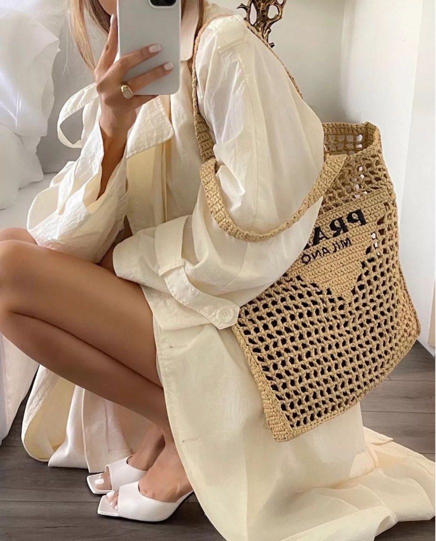 ⚜️Prada Crochet / Raffia Tote bag (Category: Luxury Bags & Wallets) located in Makati City. Submitted by 90sangel (Listing ID 1367090966, Image 1). Description: •Item: Prada crochet tote bag •Size: One size •Condition: Excellent! no hidden issues. *This includes dustbag & carecard. Additional fee may apply if you need the box. *SALE! .
