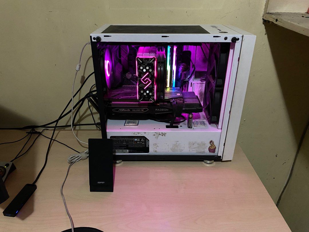 Preloved Gaming PC Desktop (Category: Desktops) located in Taguig. Submitted by srlngskpcompsvcs (Listing ID 1367002146, Image 3). Description: System unit for only 30K - ASUS B450m-plus gaming motherboard - Ryzen 5 3600 CPU - Asrock 6700 XT 12GB challenger pro triple fan GPU (undervolted since first use, with box, only used with a 60Hz monitor) - 8x3 24GB G-Skill Trident Z 3200mhz RAM (1 RGB 2 non-RGB) - Asus AX3000 (PCE-AX3000) Dual Band PCI-E 