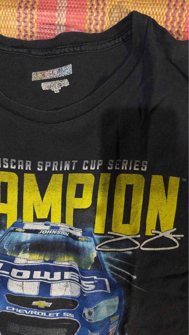 Vintage 2013 Champion Nascar Tee (Category: Tshirts & Polo Shirts ) located in Mandaluyong City. Submitted by geraldaguja123 (Listing ID 1367015996, Image 3). Description: SELLING Vintage 2013 Nascar Champion Tee Dimension: 29 inches - Length (head to bottom) 22 inches - Width (Pit to pit) Issues: Paint stains (visible sa pictures) Via gcash or cod Via lalamove delivery only .