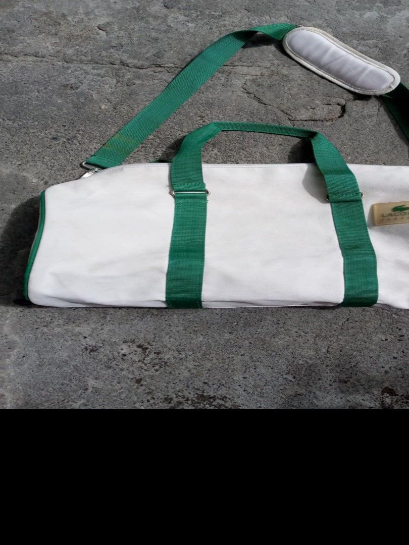 Vintage Lacoste Duffle bag (Category: Luxury Bags & Wallets) located in Manila. Submitted by vintagethrifter29 (Listing ID 1366919464, Image 1). Description: measurements 14 top to bottom 29 width left to right issue Yung mga bakal na part may mga minimal na kalawang maalis pa Naman kung magaling ka mag tanggal all in good condition 😊 message me for more info.