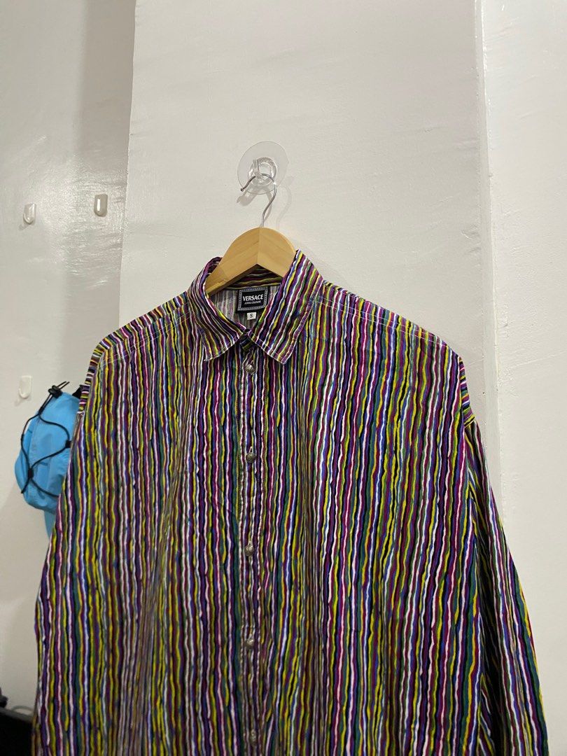 VINTAGE VERSACE JEANS COUTURE MULTI COLOR PATTERN LONGSLEEVE (Category: Luxury Apparel) located in Naga. Submitted by archivedseller (Listing ID 1367043344, Image 2). Description: •EXCELLENT CONDITION •NO FLAWS •SIZE SMALL ON TAG •AUTHENTIC •WIDTH 22.5 INCHES •LENGHT 30 INCHES.