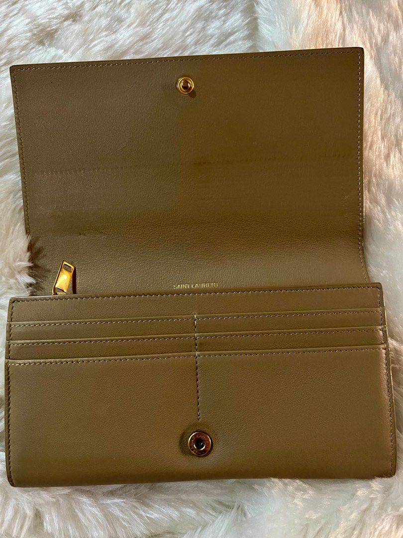 Authentic YSL large flap wallet beige (Category: Luxury Bags & Wallets) located in Muntinlupa City. Submitted by iceedevclutter (Listing ID 1366979083, Image 2). Description: Original Barely used From Jpn Free shipping!.