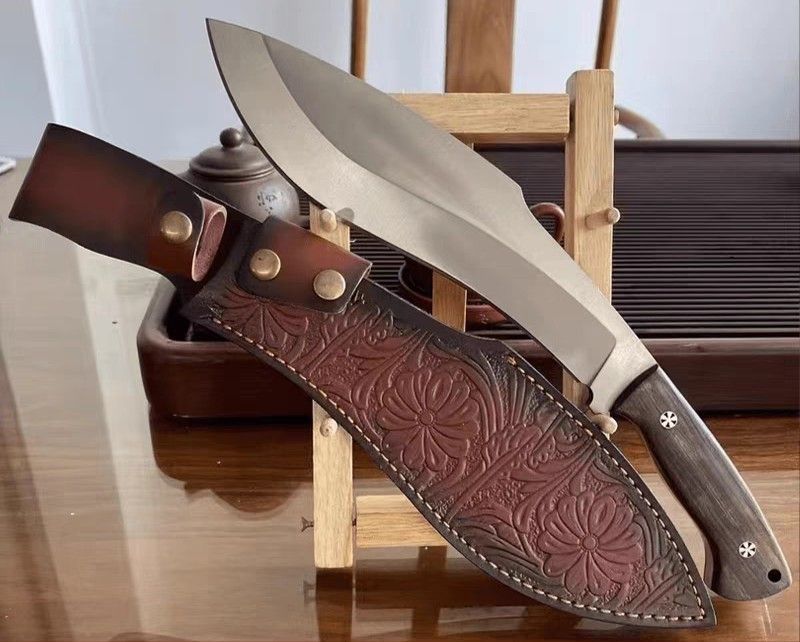8" Authentic Nepal Army Traditional Kukri (Category: Hiking & Camping) located in Manila. Submitted by pasyal (Listing ID 238483654, Image 1). Description: Nepal Army Traditional Kukri for Bushcraft Chopper 8" - Blade length 10mm ultra thick blade D-235 #65MOV manganese steel Tooled Leather Sheath Full tang Ashwood handle special pins.