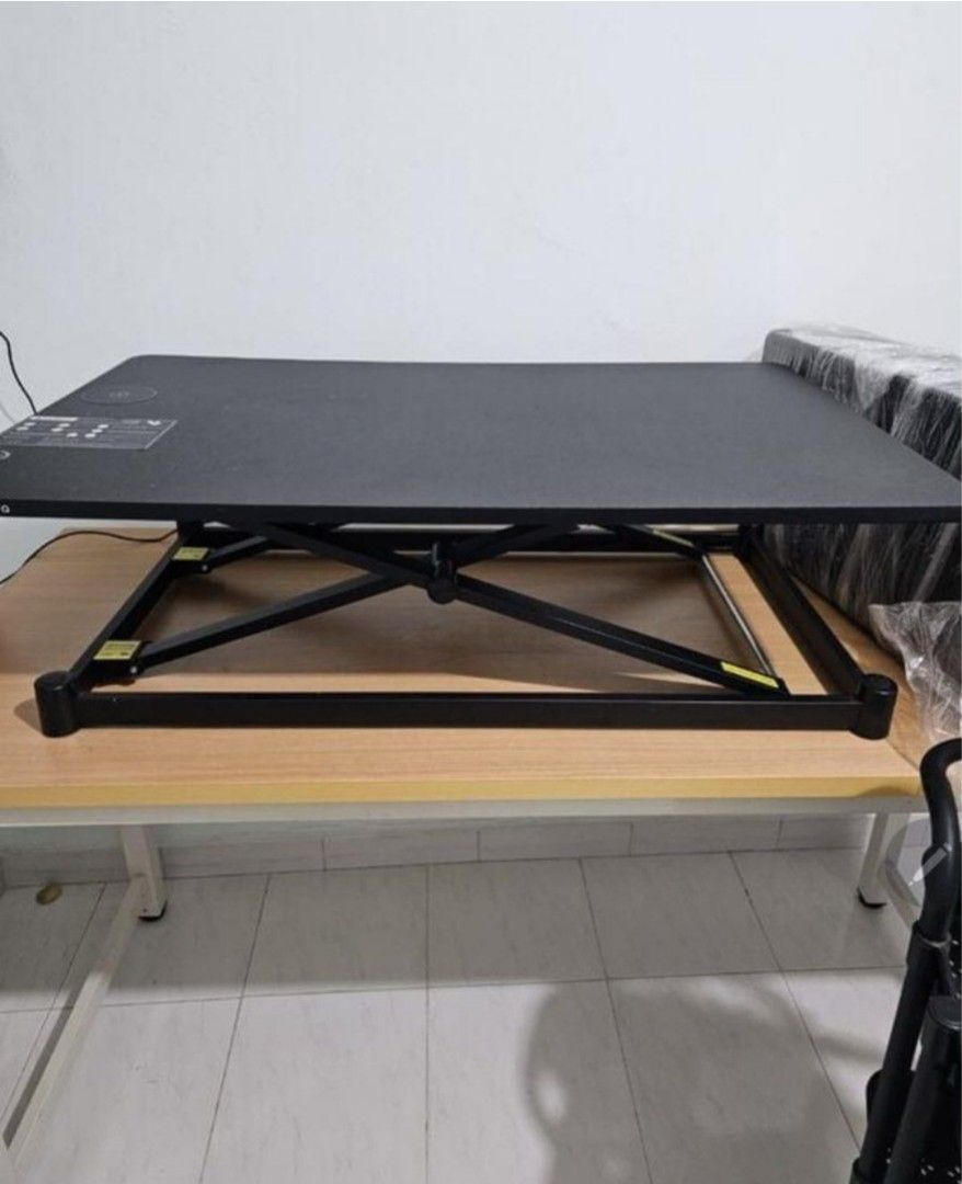 Adjustable table (Category: Tables & Sets) located in Singapore. Submitted by ezenh (Listing ID 1371991769, Image 3). Description: Leband Electric Sit-Stand Desk Converter! Do you have a fixed table / carpentry table but still want an electric standing table? Look no further! py christoz The Leband Electric Sit-Stand Desk gives you the freedom to get off your chair and onto your feet, while still getting plenty done. It features a quiet but power