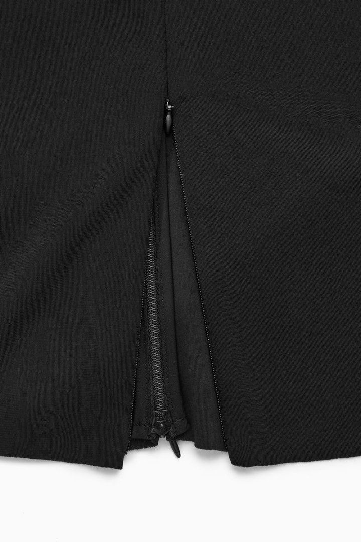 Authentic COS Adjustable slit midi skirt (Category: Skirts) located in Cagayan de Oro. Submitted by jcb2017 (Listing ID 1372018698, Image 3). Description: Used twice Has several zippers to customize slit/s All of the items listed here were purchased directly from the stores at full price. I am simply decluttering, i do not resell 😅🥰 .