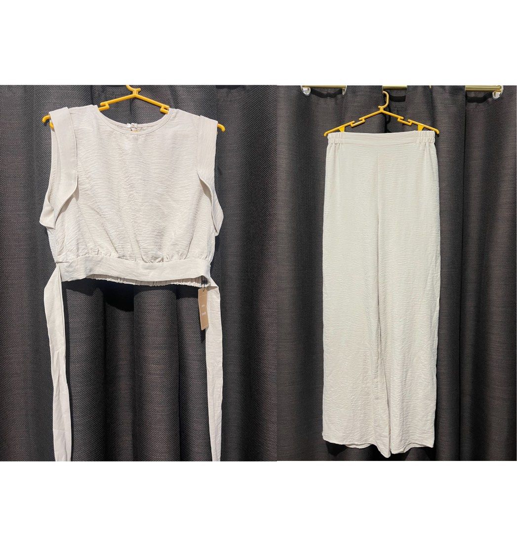 BNWT Shein Frenchy Set Coordinates (Category: Sets or Coordinates) located in Mandaluyong City. Submitted by blzstr (Listing ID 1371949046, Image 1). Description: Crop top and wide pants set Brand new with tag Light beige Tie back sleeveless crop top and pants coordinates set.