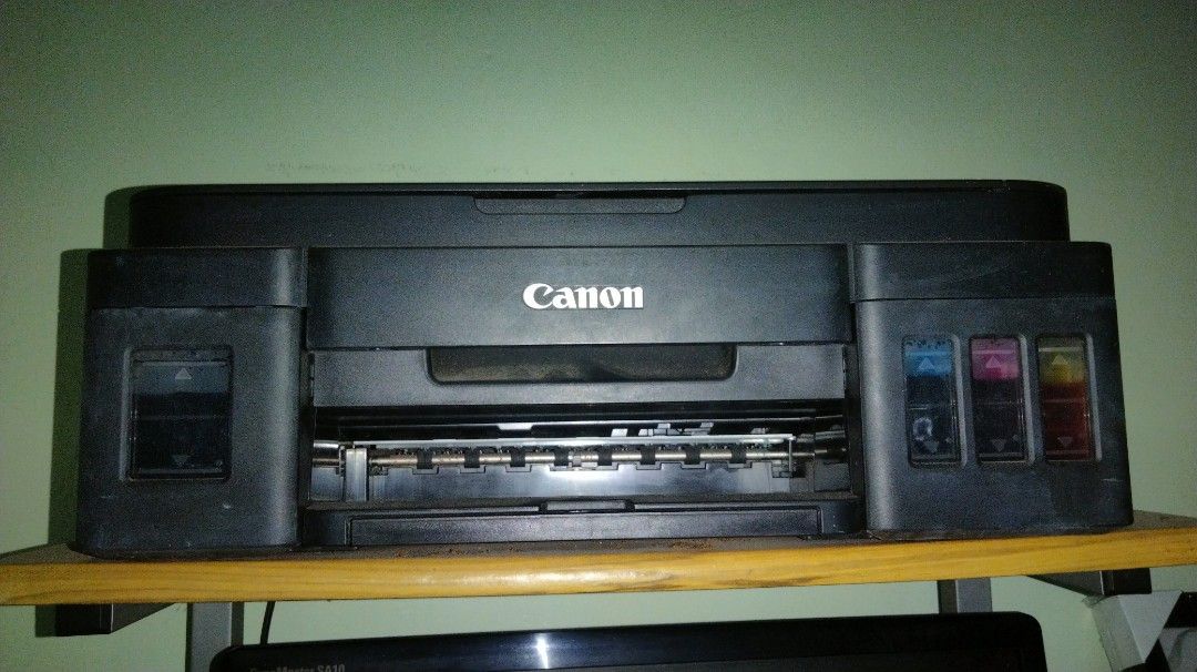 CANON PRINTER (Category: Printers, Scanners & Copiers) located in Cebu City. Submitted by aky_deee (Listing ID 1372063311, Image 1). Description: ✅Bought this for 6k sa SM City Cebu🥹 ✅Still usable but YOU NEED TO REPAIR IT FIRST ✅With inks inside the printer 90% full pa. ✅Still negotiable pa po🥹. Just offer lang and let's see what we can do😶‍🌫️ ✅Flaws: don't know sa model ng printer since I can't find the box na but I think you can check the 