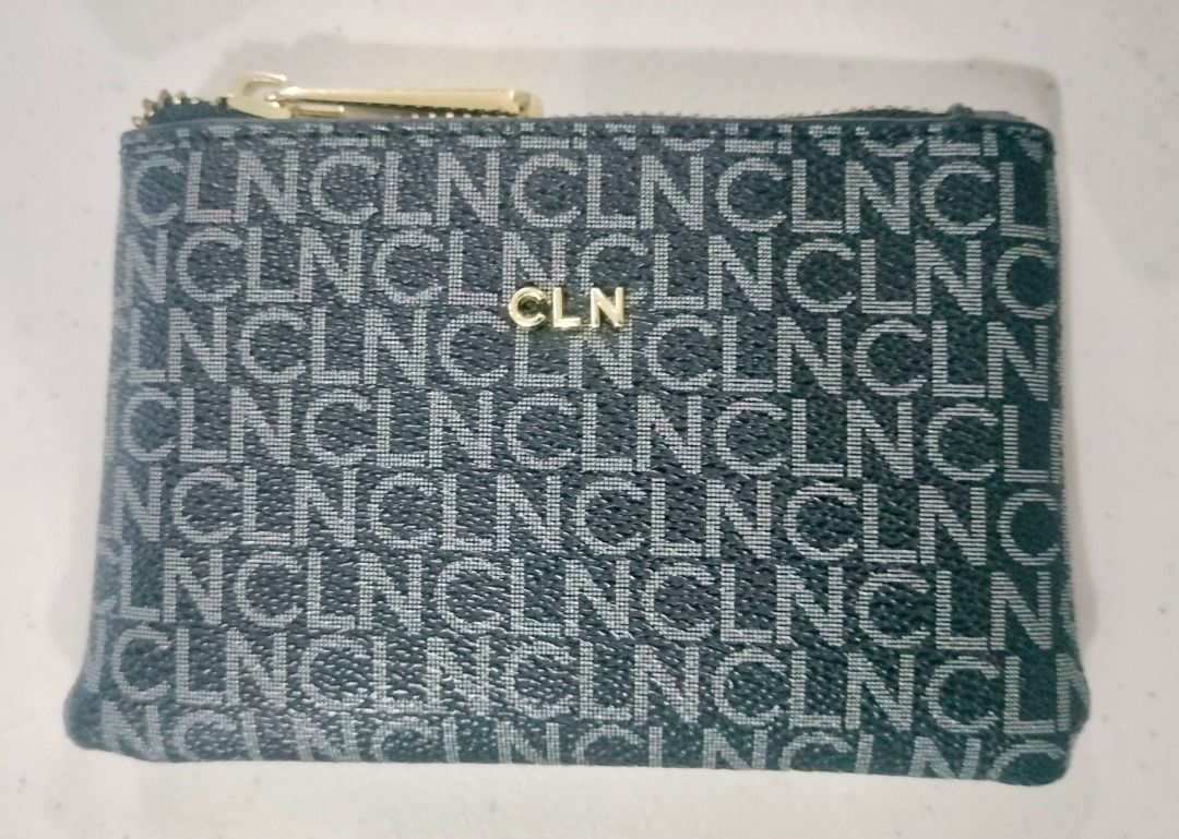 CLN Coin purse Wallet (Category: Wallets & Card holders) located in Manila. Submitted by rinroo (Listing ID 1372003008, Image 1). Description: MPO CLN Wallet RFS: decluttering Flaws: rubs on leather edge of zipper (QS SEEN ON PICTURE) PLEASE READ ME -looks good as new except for the rub as seen on the pic (pics are is) - smooth gold zipper - gold keyring inside - slot for card (can fit two) - fits folded bills and coins comes with styro filler, d