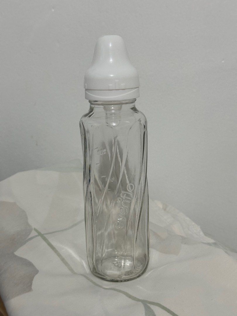 Evenflo Classic Glass Bottle 8oz/250ml (Category: Breastfeeding & Bottle Feeding) located in Quezon City. Submitted by preciouslira (Listing ID 1372008618, Image 2). Description: Originally shipped from US, never been used. Good for 6 months old and above. This bottle is suggested by a US Lactation nurse. RFS: too many bottles and baby doesn't need it yet because baby is still newborn -Unique twist shape is easy to hold and comfortable -Integrate