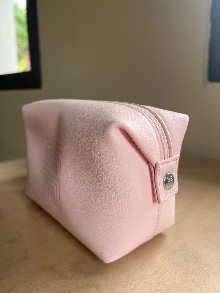 Givenchy Blush Pink Make-Up Pouch (Category: Makeup) located in Muntinlupa City. Submitted by bff_findsph (Listing ID 1371914548, Image 3). Description: Condition: Unused Issue: Tiny blue mark (not very visible) due to lack storage Color: Blush Pink Interior: Clean Exterior: Clean with a minor blue mark .