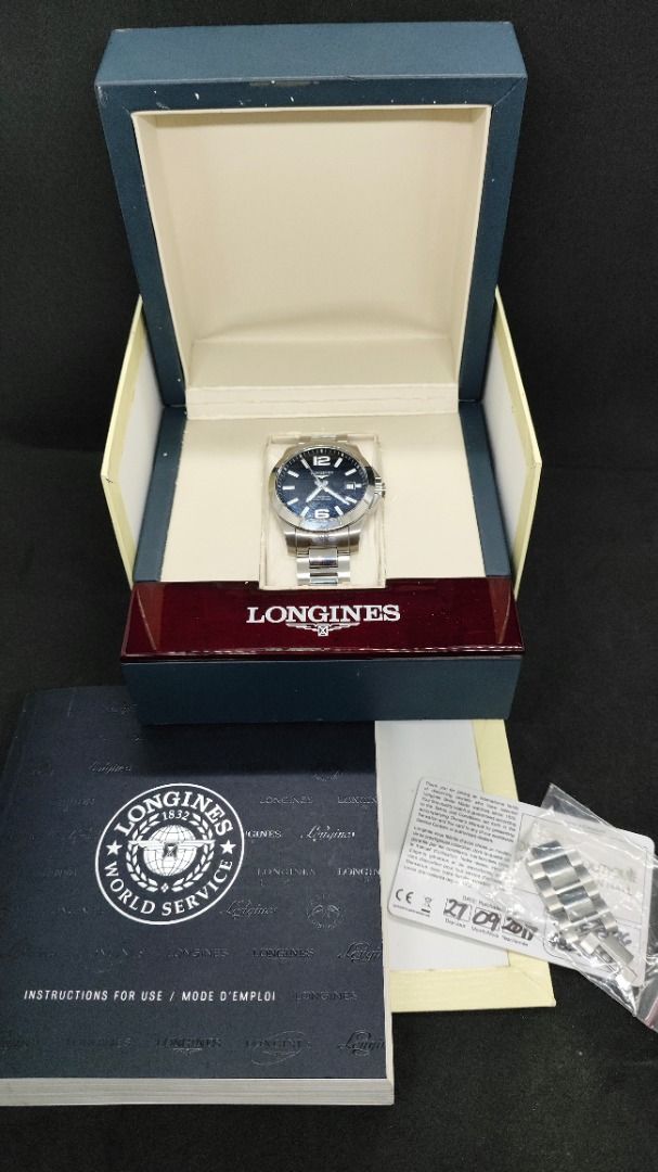 Longines Conquest 39mm Auto black and silver dial (Category: Luxury Watches) located in Iloilo. Submitted by fcbernas (Listing ID 1372019447, Image 2). Description: For sale Longines Conquest 39mm Auto Black and Silver dial Both full set (outer box, inner box, cards, booklets, extra links) Case Shape Round Case Dimensions 39mm Case Thickness 11.5mm Case Material Stainless Steel Dial Color Black/Silver Crystal Scratch Resistant Sapphire Bezel Fixe