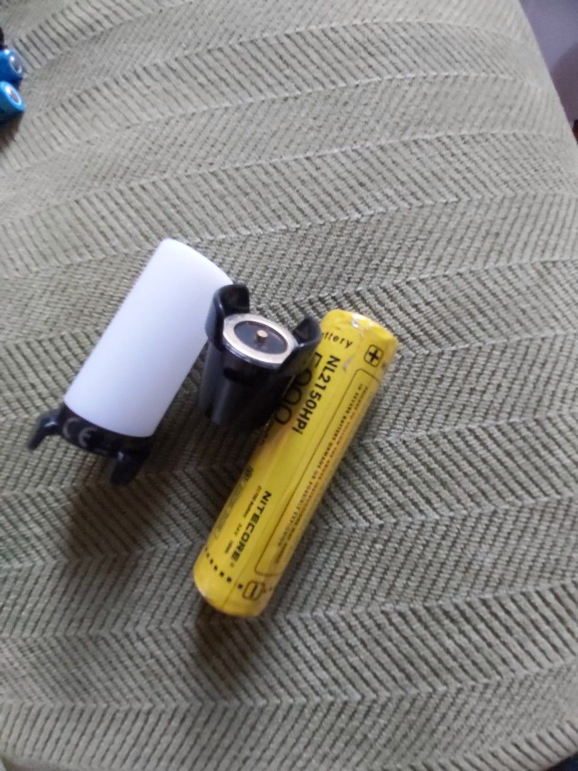Nitecore NL2150 Battery and Lamp (Category: Hiking & Camping) located in Mandaluyong City. Submitted by j.alonso (Listing ID 1372032139, Image 1). Description: Nitecore NL2150 Battery and Lamp with charger adapter. Used a few times only.