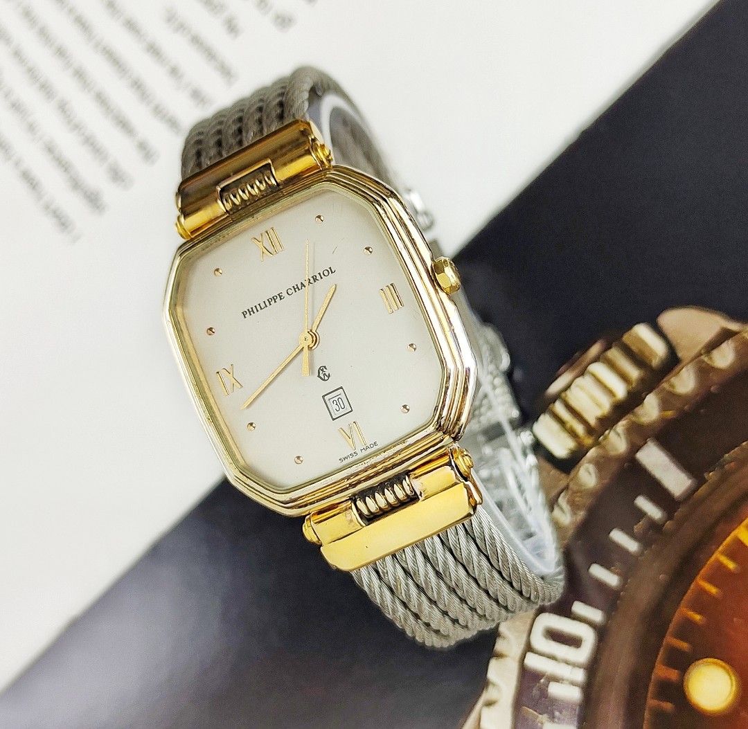 Philippe Charriol St. Tropez (Category: Luxury Watches) located in Manila. Submitted by ab.authentic.collection (Listing ID 1371958893, Image 3). Description: Available for Sale Philippe Charriol St. Tropez - 28mm x 30mm from lugs to lugs - Quartz; Keeps Time - Original Charriol cable style bracelet. - Approx. 7 inches wrist - With free travel leather pouch included - Unit only Open for Meetups (Sure buyer) Price: Php25,000.