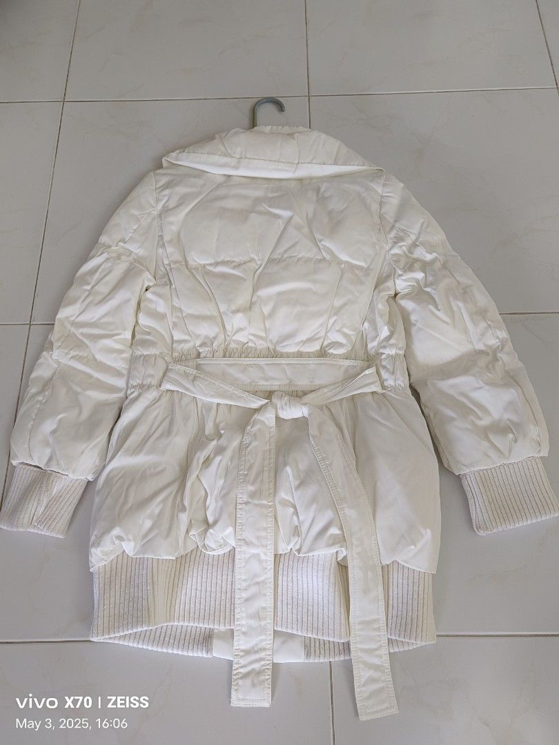 Winter Jacket (Category: Coats, Jackets and Outerwear) located in Singapore. Submitted by cheerfully0124 (Listing ID 1372014928, Image 1). Description: Pure white colour of lady winter Jacket with two sides pockets in front can be zip up and button on. No yellowish spot (see to believe) it was purchased from overseas seldom used.
