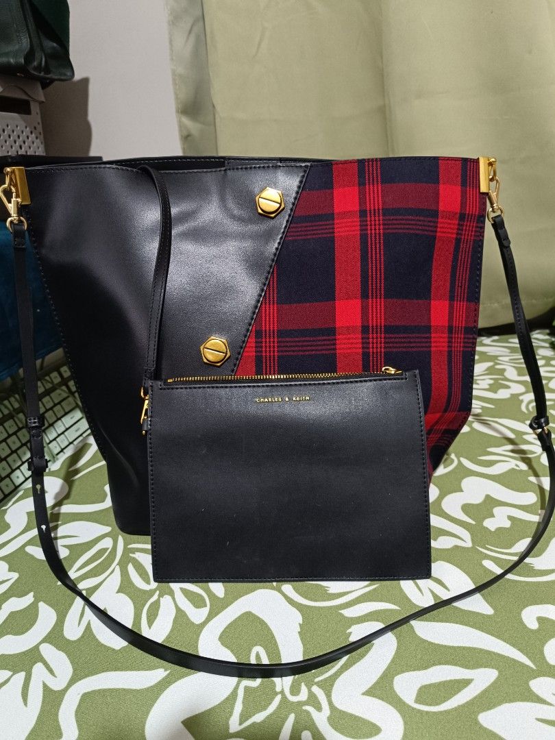 Charles and Keith (Category: Purses & Pouches) located in Manila. Submitted by cheapetc (Listing ID 1372257560, Image 2). Description: very very good condition with pouch sling replaced also charles and keith.