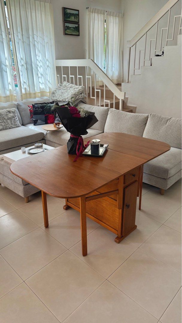 Folding Table (Category: Tables & Sets) located in Singapore. Submitted by tamaw (Listing ID 1372111170, Image 2). Description: Restored character folding table originally from London. Has cupboard and draws in the centre part. Great for tight spaces and compact living. 150cm Fully Extended (length) 40cm Folded (length) 87cm wide 74 cm Height.