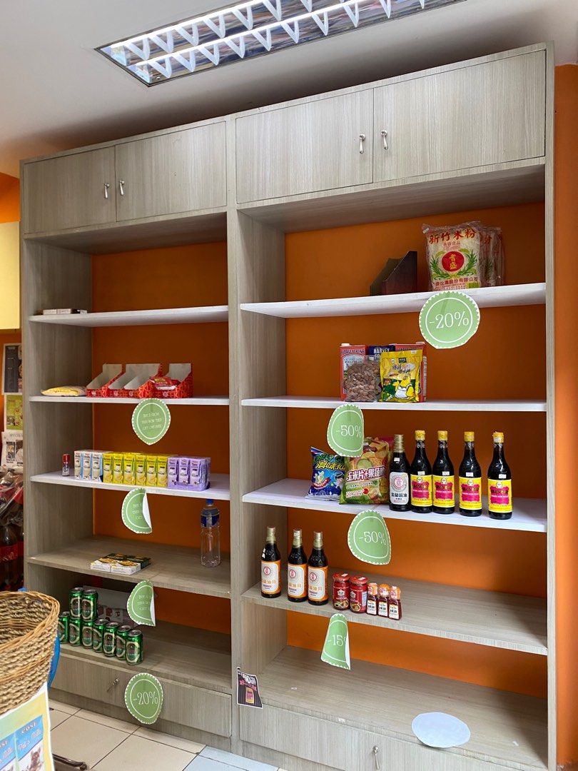 Grocery wall display module (Category: Shelves, Cabinets & Racks) located in Pasig City. Submitted by sms2019 (Listing ID 1372153688, Image 1). Description: Can be used for grocery, garage, basement shelving. 104.5 x 37.5 x 235 cm Made of wood in laminate finish (wood texture) With shelves for display Drawers at bottom layer. Cabinets at top layer. 4 sets available Price negotiable .