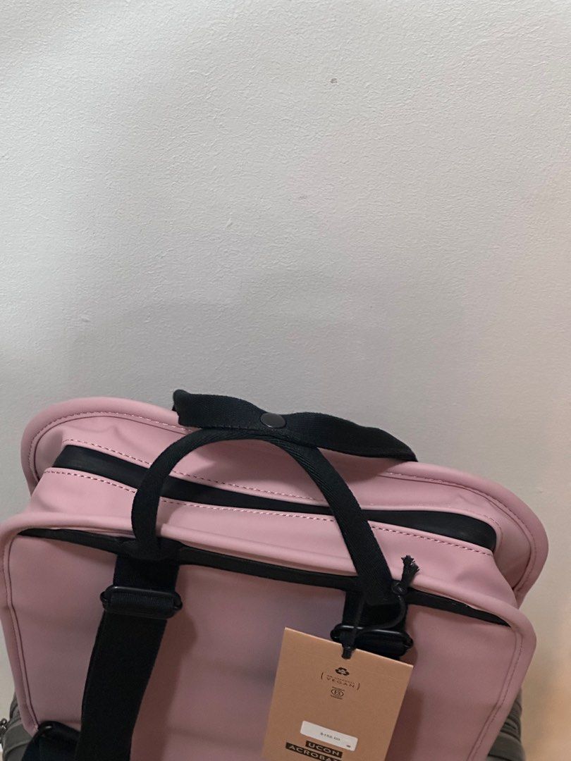 Laptop Bag Medium Backpack Rose Pink (Category: Laptop Bags & Sleeves) located in Singapore. Submitted by dejavu_3023 (Listing ID 1372111869, Image 3). Description: * Waterproof. Main compartment closes with water repellent zipper * Exterior pocket on the front closes with magnets * Two mesh interior pockets e.g. for cell phone, wallet or cable * Elastic band bottle holder and key strap inside * Laptop compartment: 26 x 33 cm * Fits Up to 13” Mac